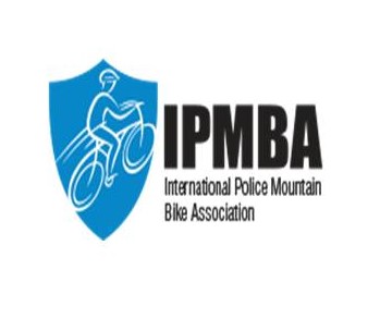 Logo of the International Police Mountain Bike Association with a cyclist on a shield.