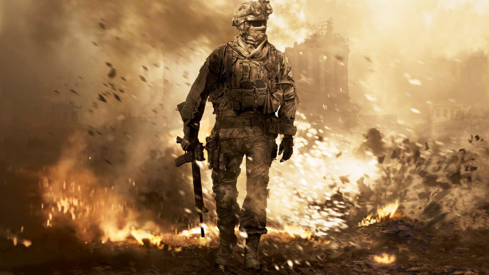 A soldier walks through a fiery battlefield holding a rifle.