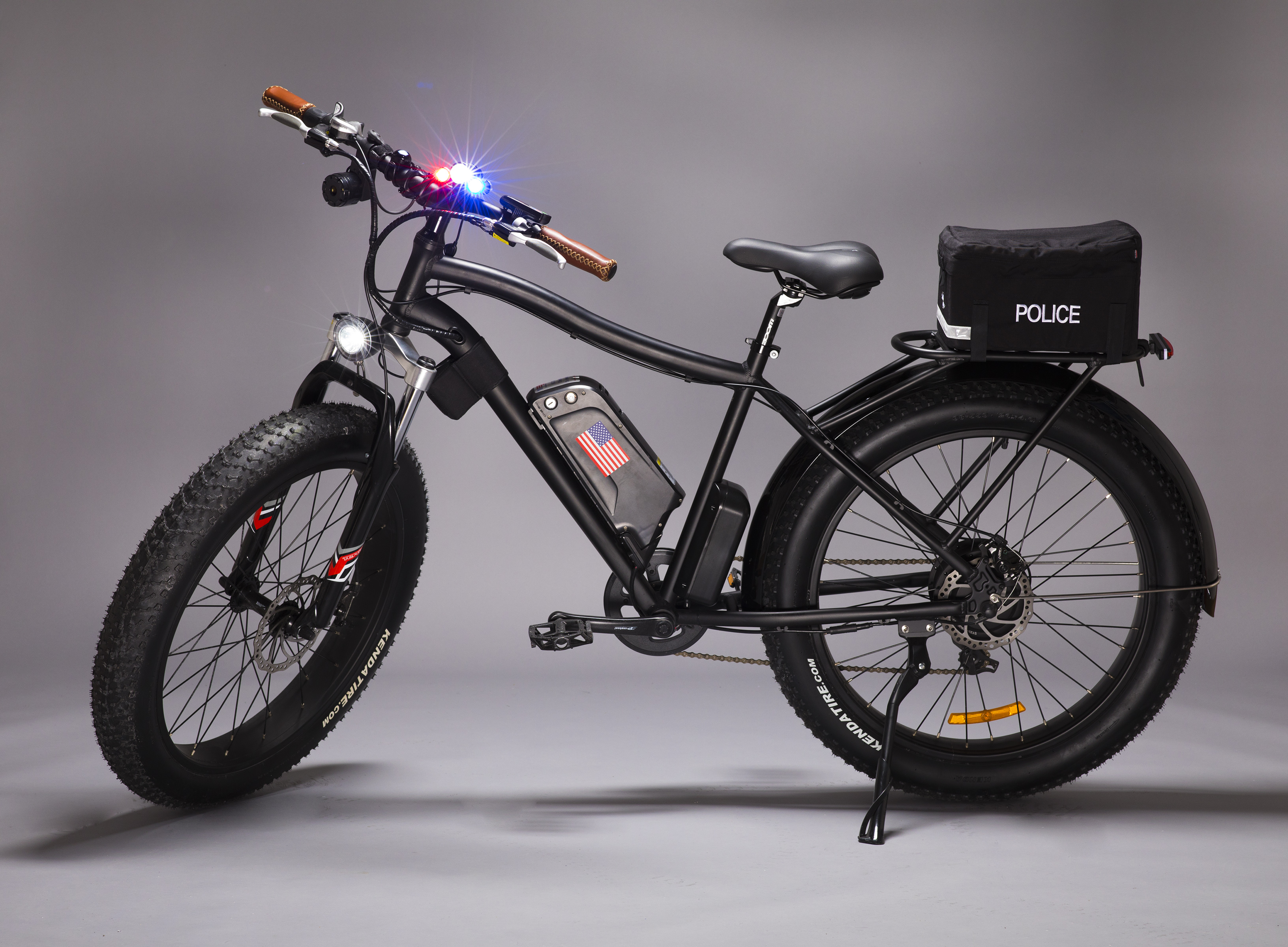 Black electric police bike with flashing lights and sturdy build.