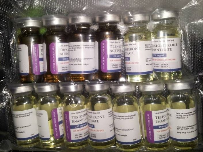 Vials of labeled liquid solutions in packaging.