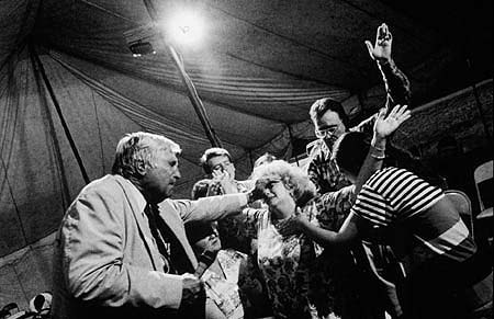 Group participating in a spiritual healing session.