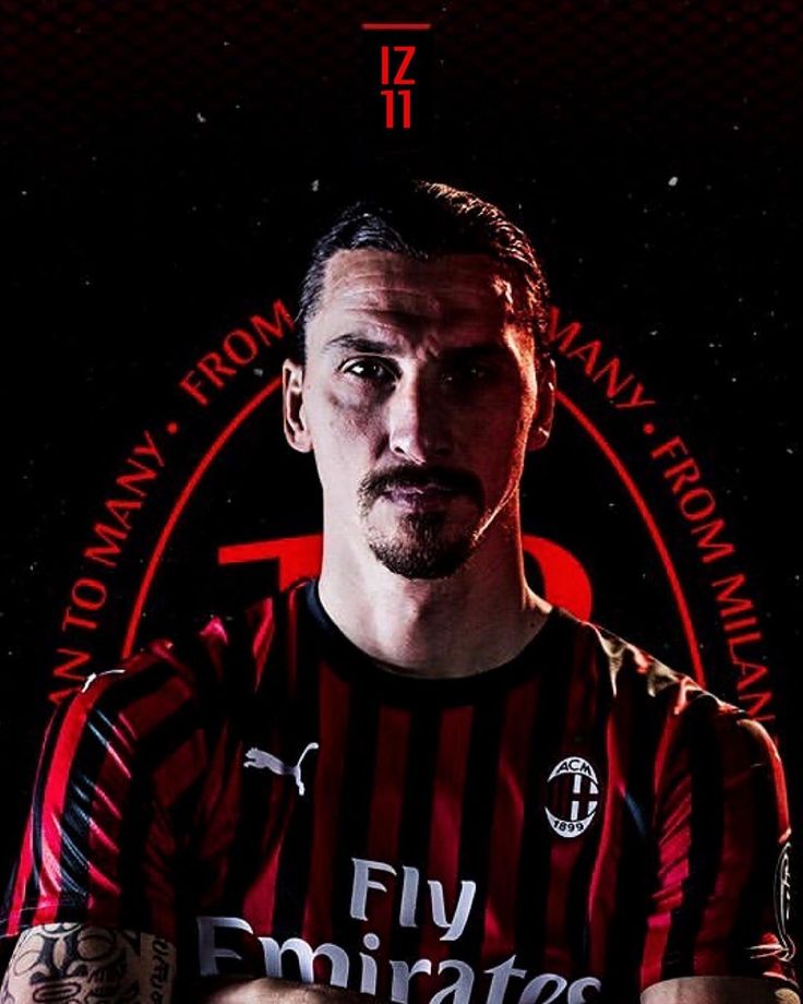 Soccer player in red and black jersey.